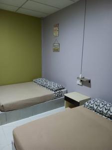 Ένα ή περισσότερα κρεβάτια σε δωμάτιο στο Marina's Redang Boat