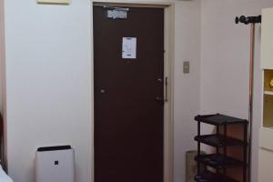 TV a/nebo společenská místnost v ubytování 交通便利、駅2分