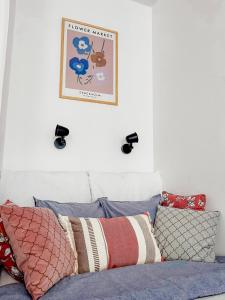 Postel nebo postele na pokoji v ubytování Polpo Apartments - Nawrot 50