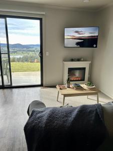 Televisyen dan/atau pusat hiburan di The Top Place Retreat