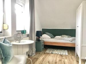 Ένα ή περισσότερα κρεβάτια σε δωμάτιο στο SEE eck Timmel Modern retreat