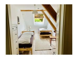 Ένα ή περισσότερα κρεβάτια σε δωμάτιο στο Holiday apartment Nordnest +31 φωτογραφίες
