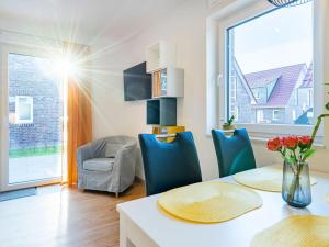 Ruang duduk di Nitschke - vakantiewoning Flut