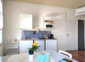 A kitchen or kitchenette at Dimore della Fausa
