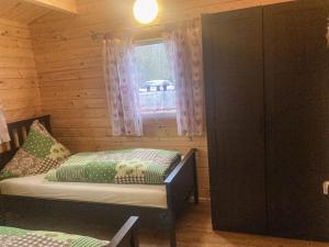 Ένα ή περισσότερα κρεβάτια σε δωμάτιο στο Lenerz Comfortable holiday residence