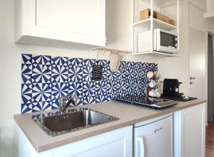 A kitchen or kitchenette at Dimore della Fausa