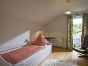 En eller flere senge i et værelse på Kaiserblick Modern retreat