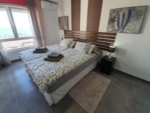 Ένα ή περισσότερα κρεβάτια σε δωμάτιο στο José Comfortable holiday residence +12 φωτογραφίες