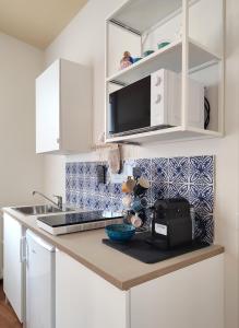 A kitchen or kitchenette at Dimore della Fausa