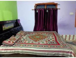 Posteľ alebo postele v izbe v ubytovaní Gidara Darshan Homestay, Gangnani
