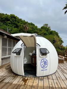 a white iguana tent sitting on a deck at Iojima BeachHouse - Vacation STAY 97622v in Nagasaki