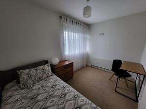 Postel nebo postele na pokoji v ubytování Carrigaline Delightful Home
