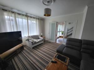 Posezení v ubytování Carrigaline Delightful Home