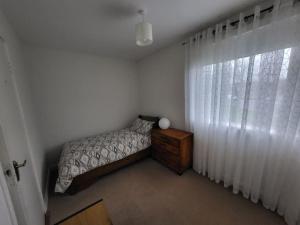 Postel nebo postele na pokoji v ubytování Carrigaline Delightful Home