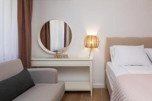 Postel nebo postele na pokoji v ubytování Kovač Family Suites
