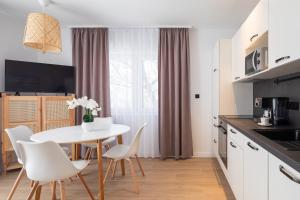Kuchyň nebo kuchyňský kout v ubytování Kovač Family Suites