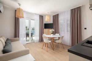 TV a/nebo společenská místnost v ubytování Kovač Family Suites