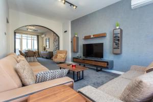 Posezení v ubytování Urban Elegance Apartment