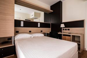 Augustus Hotel Riccione客房内的一张或多张床位