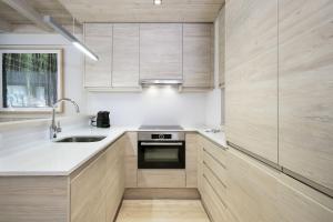 Kuchyňa alebo kuchynka v ubytovaní Luderna - Apartamento Val de Ruda B26 des Garonets + 5 fotografií