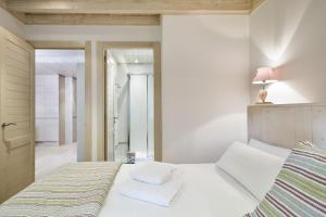 Posteľ alebo postele v izbe v ubytovaní Luderna - Apartamento Val de Ruda B26 des Garonets