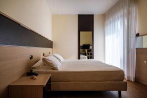 Augustus Hotel Riccione客房内的一张或多张床位