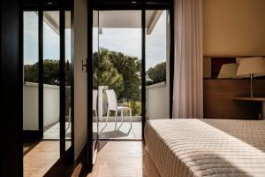 Augustus Hotel Riccione客房内的一张或多张床位