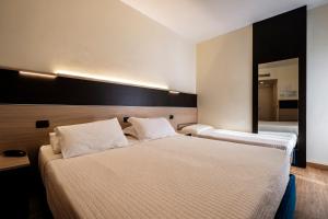 Augustus Hotel Riccione客房内的一张或多张床位