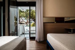 Augustus Hotel Riccione客房内的一张或多张床位