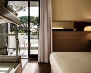 Augustus Hotel Riccione客房内的一张或多张床位