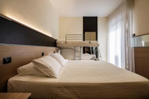 Augustus Hotel Riccione客房内的一张或多张床位