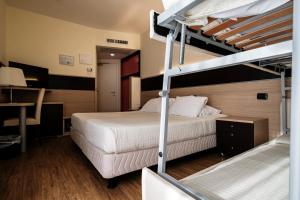 Augustus Hotel Riccione客房内的一张或多张床位