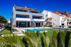 Swimmingpoolen hos eller tæt på New apartment Budinski 1st row & pool