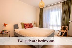 Postel nebo postele na pokoji v ubytování Cozy Center Druskininkai