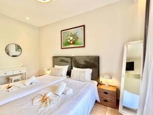Katil atau katil-katil dalam bilik di Beachfront Suites GardenMare by DadoVillas