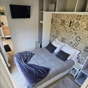 Un pat sau paturi într-o cameră la Quinta Miminel
