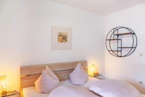 Postel nebo postele na pokoji v ubytování Aschaubichl - Wohnung Alpenrose