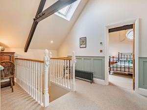 een trap in een huis met een dakraam bij 4 Bed in Soudley 94433 in Lower Soudley