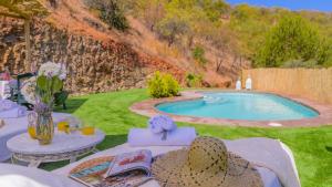 The swimming pool at or close to El Palomar Guaro by Ruralidays