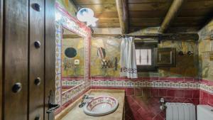 A bathroom at El Palomar Guaro by Ruralidays