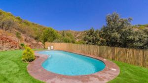 The swimming pool at or close to El Palomar Guaro by Ruralidays