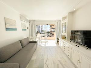 Telewizja i/lub zestaw kina domowego w obiekcie Erisa Terral Apartments
