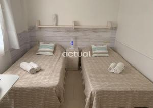 Postel nebo postele na pokoji v ubytování CASA ESLORA 26