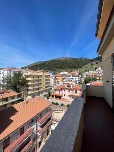 a view of a city from the balcony of a building at Heaven's Door in San Giovanni Rotondo