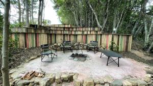 a group of chairs and a table and a fire pit at Shimanto Yamamizuki - Vacation STAY 36958v in Shimanto