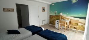 Postel nebo postele na pokoji v ubytování Escales dans les dunes