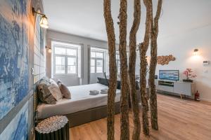 Televisyen dan/atau pusat hiburan di GuestReady - Nature-themed Studio +16 gambar
