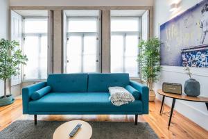 Et opholdsområde på GuestReady - High-ceiling urban retreat in Porto + 20 billeder