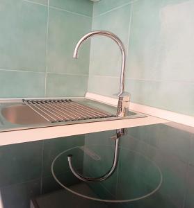 a kitchen sink with a faucet on a counter at L'Eden di Turo Brand New Loft in Conca dei Marini +48 photos