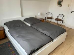 Postelja oz. postelje v sobi nastanitve Ferienhaus Constanze Mücheln am Geiseltalsee